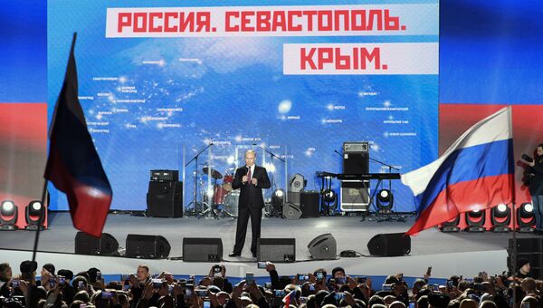 Президент РФ Владимир Путин выступает на концерте-митинге Россия. Севастополь. Крым в Севастополе. 14 марта 2018