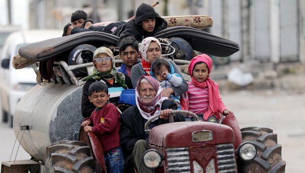 Жители Африна покидают свои дома, Сирия. 10 марта 2018 года