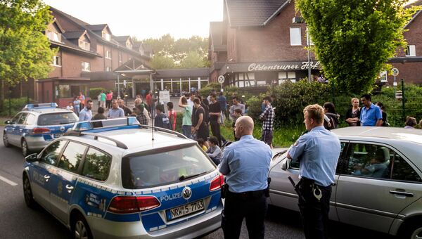 Германская полиция на месте столкновения чеченских и иракских беженцев в городе Билефельд