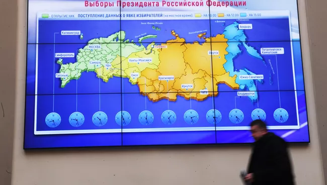 Схема с данными о явке избирателей на выборах президента РФ на экране в информационном центре Центральной избирательной комиссии РФ. 18 марта 2018