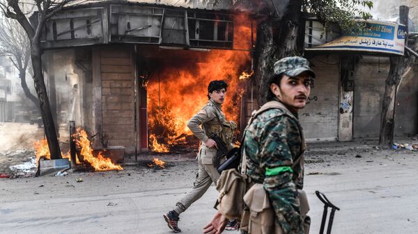  Бойцы поддерживаемой Турцией Свободной армии Сирии в Африне, Сирия. 18 марта 2018