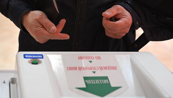 Комплекс обработки избирательных бюллетеней во время выборов президента Российской Федерации. 18 марта 2018