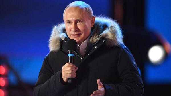 Владимир Путин во время митинга-концерта на Манежной площади в Москве
