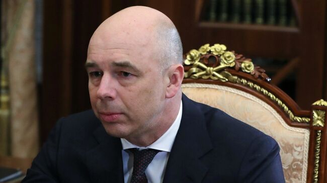 Министр финансов РФ Антон Силуанов во время встречи с президентом РФ Владимиром Путиным. 22 марта 2018 Министр финансов РФ Антон Силуанов во время встречи с президентом РФ Владимиром Путиным. 22 марта 2018