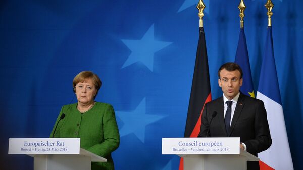 Канцлер Германии Ангела Меркель и президент Франции Эммануэль Макрон на саммите ЕС в Брюсселе.  23 марта 2018