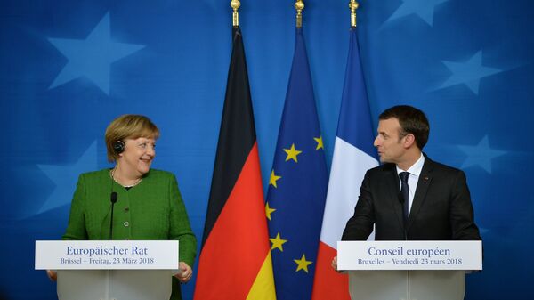 Канцлер Германии Ангела Меркель и президент Франции Эммануэль Макрон на саммите ЕС в Брюсселе. 23 марта 2018