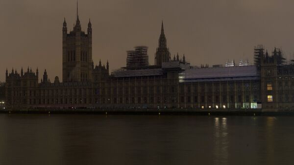 Вестминстерский дворец после отключения подсветки в рамках экологической акции Час Земли в Лондоне