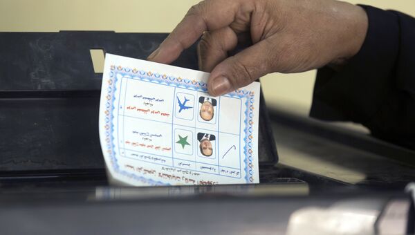 Голосование во время президентских выборов на избирательном участке в Каире. 26 марта 2018