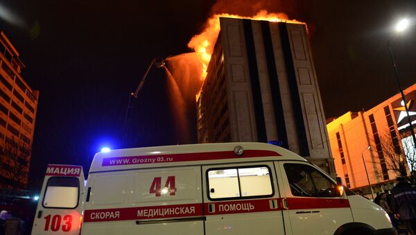 Пожар на крыше многоэтажного дома