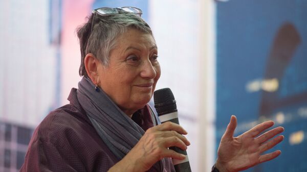 Writer Lyudmila Ulitskaya speaks at the opening of the Moscow International Book Fair on VDNKh
