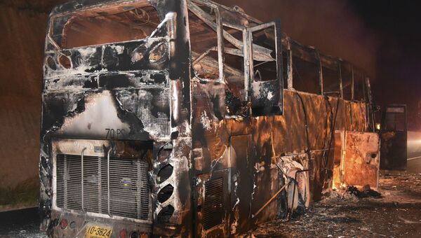 Последствия пожара в двухъярусном автобусе в провинции Так в Таиланде. 30 марта 2018