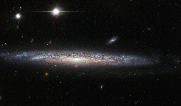 Галактики NGC 5714 и NGC 1787, снятые телескопом Хаббл
