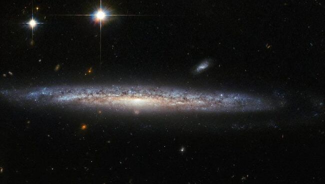 Галактика NGC 5714 и NGC 1787, снятые телескопом Хаббл