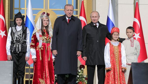 Президент РФ Владимир Путин и президент Турецкой Республики Реджеп Тайип Эрдоган на церемонии запуска строительства первого энергоблока АЭС Аккую. 3 апреля 2018