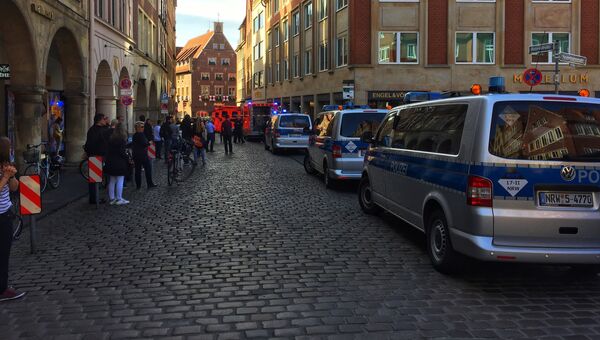 Полицейские в центре Мюнстера, где произошел теракт, Германия. 7 апреля 2018
