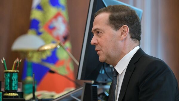 Председатель правительства РФ Дмитрий Медведев во время встречи с президентом РФ Владимиром Путиным. 10 апреля 2018