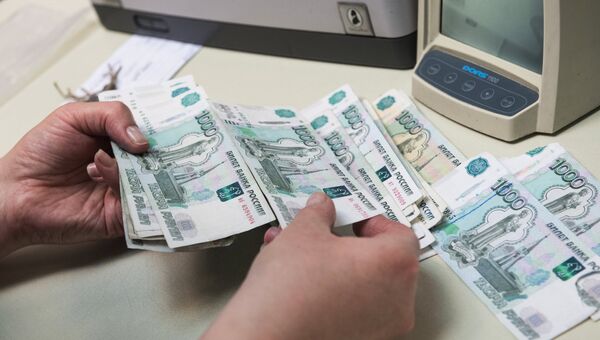 Банкноты номиналом 1000 рублей. Архивное фото