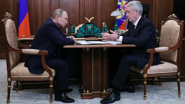 Владимир Путин и мэр Москвы Сергей Собянин во время встречи. 14 апреля 2018