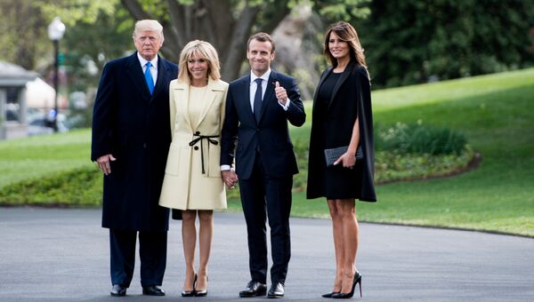 Президент США Дональд Трамп и президент Франции Эмманюэль Макрон с супругами во время визита президента Франции в Вашингтон. 23 апреля 2018