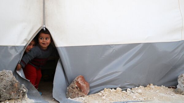 Дети, эвакуированные из Восточной Гуты, в лагере Баб-аль-Хава в сирийской провинции Идлиб