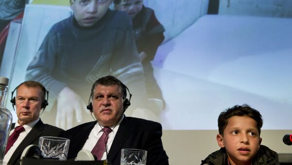 Сирийский мальчик Хасан Диаб на пресс-конференции по вопросу применения химического оружия в Сирии в Гааге. 26 апреля 2018