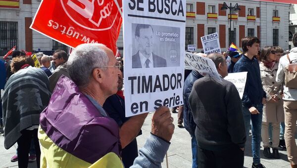 Участники митинга, посвященного Международному дню трудящихся в Мадриде. 1 мая 2018