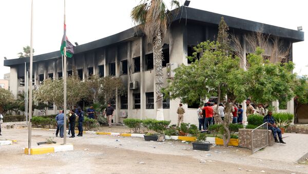 На месте взрыва в штаб-квартире Высшей избирательной комиссии в Триполи, Ливия
