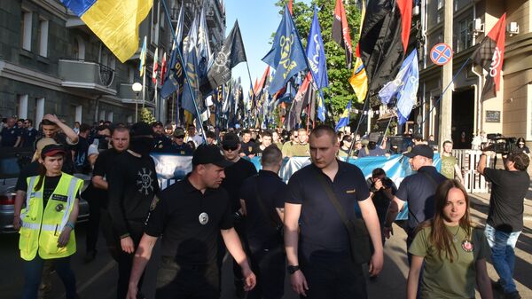 Участники марша националистов, приуроченного к четвёртой годовщине событий 2 мая 2014 года в Доме профсоюзов в Одессе