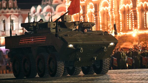 Бронетранспортер (БТР) на колесной платформе Бумеранг на репетиции военного парада на Красной площади, посвященного 73-й годовщине Победы в Великой Отечественной войне