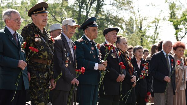 Митинг-реквием по случаю Дня памяти и примирения и 73-й годовщины победы над нацизмом во Второй мировой войне возле Монумента Мужества в Киеве. 8 мая 2018