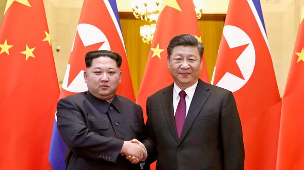 Лидер КНДР Ким Чен Ын с президентом Китая Си Цзиньпином 