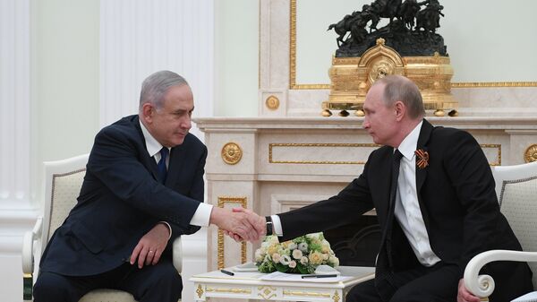 Президент РФ Владимир Путин и премьер-министр государства Израиль Биньямин Нетаньяху во время встречи. 9 мая 2018