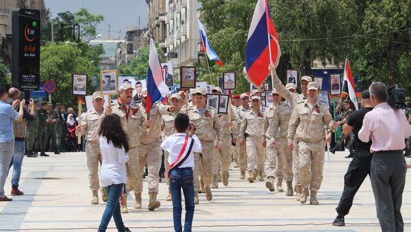 Участники акции Бессмертный полк в Латакии, Сирия. 8 мая 2018