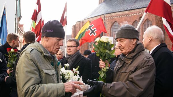 Участники марша бывших латышских легионеров Ваффен СС и их сторонников в Риге. 16 марта 2018