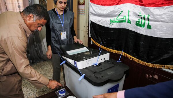 Голосование на избирательном участке в Багдаде. 12 мая 2018