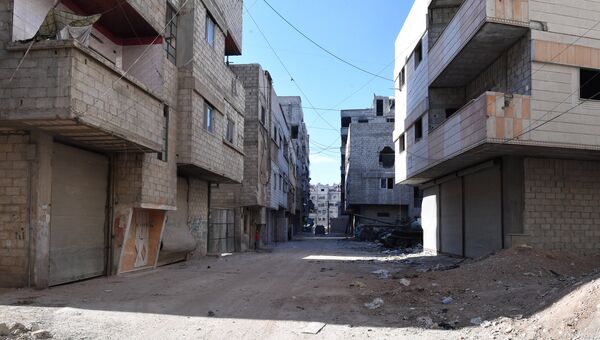 Ситуация в районе лагеря беженцев Ярмук в южном пригороде Дамаска. Архивное фото