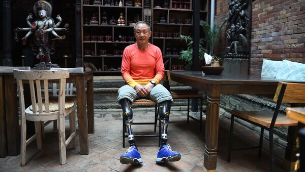 Лишенный ног 70-летний китайский альпинист Ся Боюй
