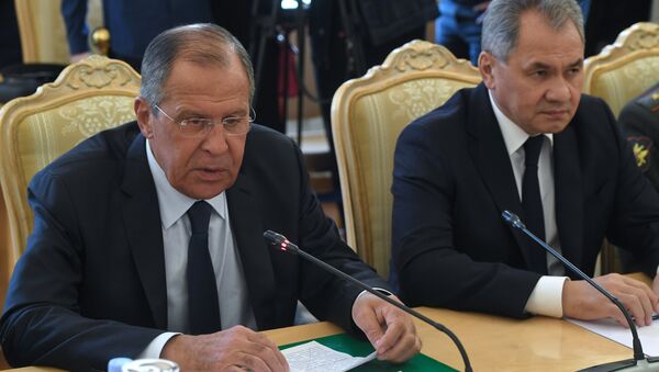 Сергей Лавров и Сергей Шойгу во время переговоров глав внешнеполитических и оборонных ведомств России и Египта. 14 мая 2018