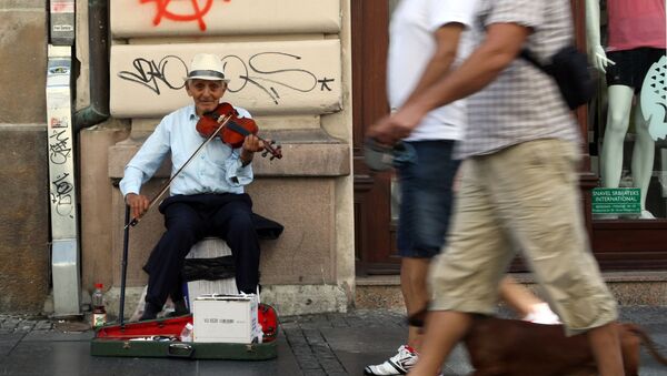 Уличный музыкант в Белграде