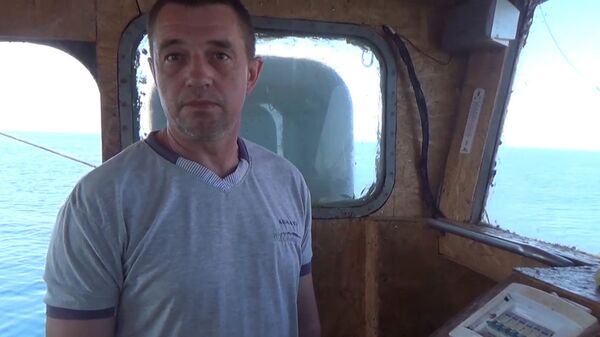 Капитан украинского рыболовецкого судна ЯМК-0041, задержанного ФСБ РФ в акватории Черного моря. 16 мая 2018