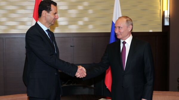  Президент РФ Владимир Путин и президент Сирийской арабской республики Башар Асад во время встречи. 17 мая 2018