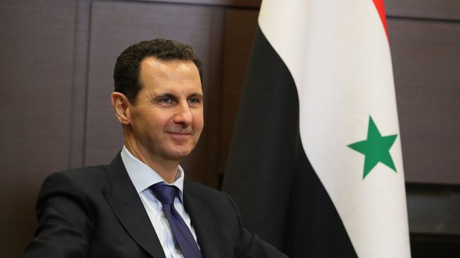 Президент Сирийской арабской республики Башар Асад во время встречи с президентом РФ Владимиром Путиным. 17 мая 2018