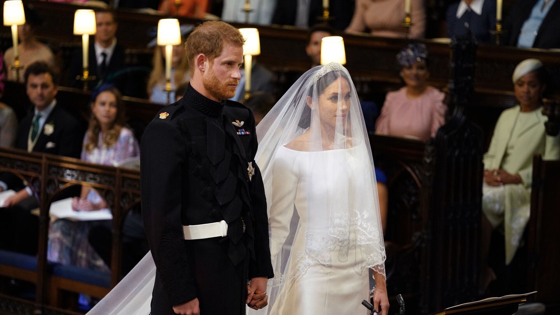 Британский принц Гарри и Меган Маркл перед началом их свадебной церемонии в часовне Св. Георгия в Виндзорском замке недалеко от Лондона, Англия. 19 мая 2018 - РИА Новости, 1920, 04.09.2020