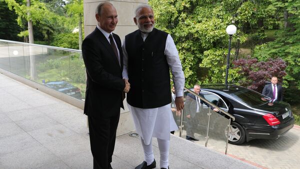 21 мая 2018. Президент РФ Владимир Путин и премьер-министр Республики Индии Нарендра Моди (справа) во время встречи. Архивное фото