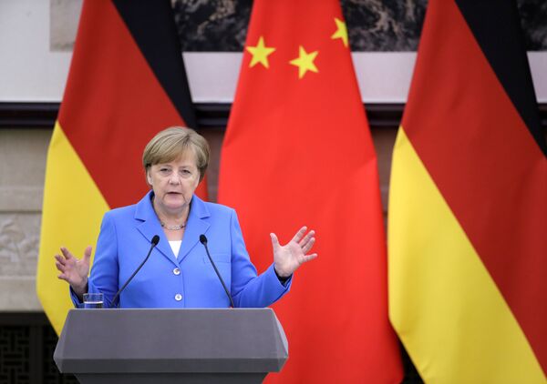 Канцлер Германии Ангела Меркель на пресс-конференции после переговоров с премьером Госсовета КНР Ли Кэцяном. 24 мая 2018 Канцлер Германии Ангела Меркель на пресс-конференции после переговоров с премьером Госсовета КНР Ли Кэцяном. 24 мая 2018