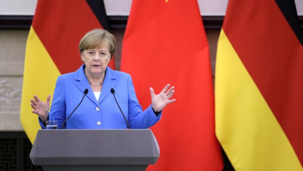 Канцлер Германии Ангела Меркель на пресс-конференции после переговоров с премьером Госсовета КНР Ли Кэцяном. 24 мая 2018