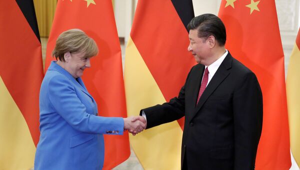 Канцлер ФРГ Ангела Меркель и председатель КНР Си Цзиньпин на встрече в Пекине. 24 мая 2018