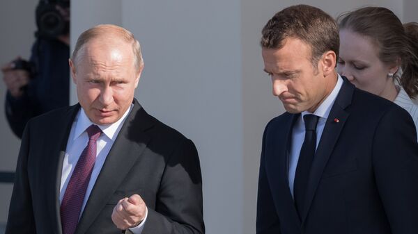 Президент РФ Владимир Путин и президент Франции Эмманюэль Макрон на полях Петербургского международного экономического форума - 2018. 24 мая 2018