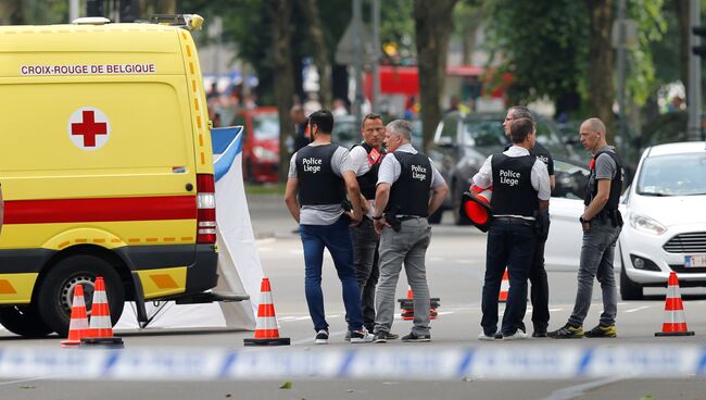 Полицейские на месте стрельбы в городе Льеж, Бельгия. 29 мая 2018