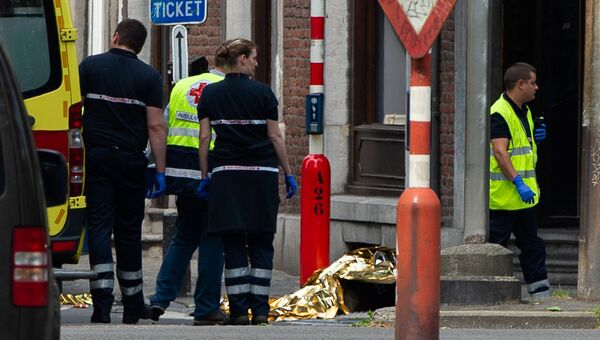 Спасатели на месте стрельбы в городе Льеж, Бельгия. 29 мая 2018